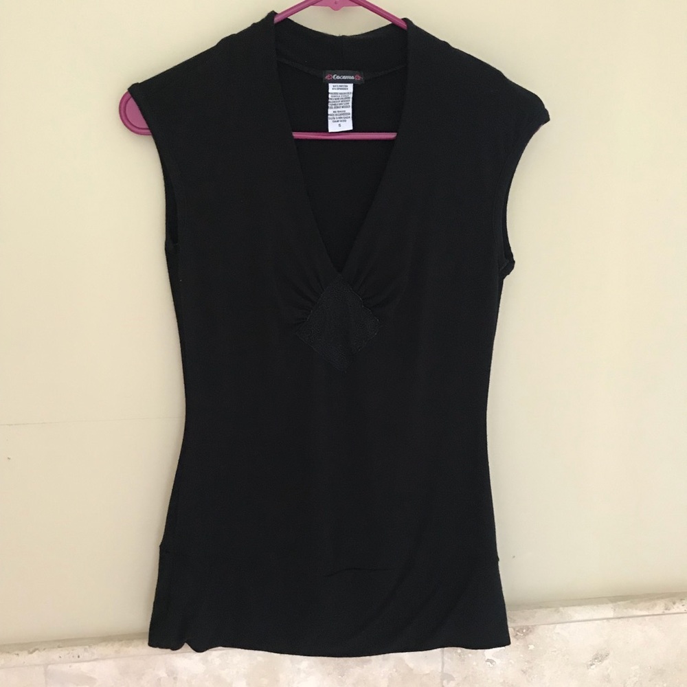 Black fitted shirt.